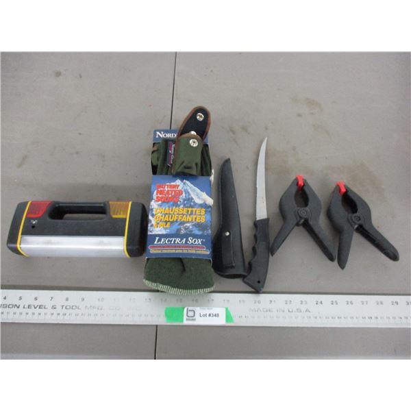 Battery heated socks, flashlight clamps