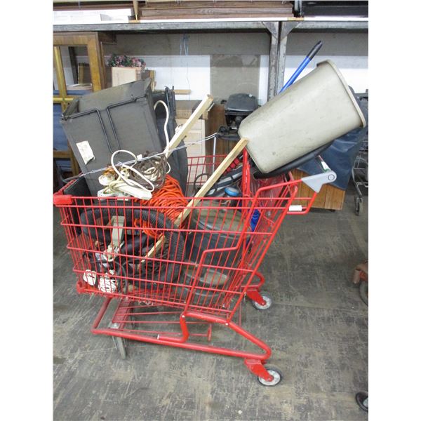 Shopping cart with electrical cords, lawn mower bagger, misc