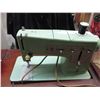 Image 2 : Wooden sewing machine cabinet with singer machine + sewing related