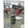 Image 1 : Garbage can with 2 rakes, sledgehammer, aluminum shovel, 2 snow shovels