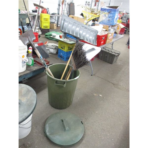 Garbage can with scraper, broom, shovels