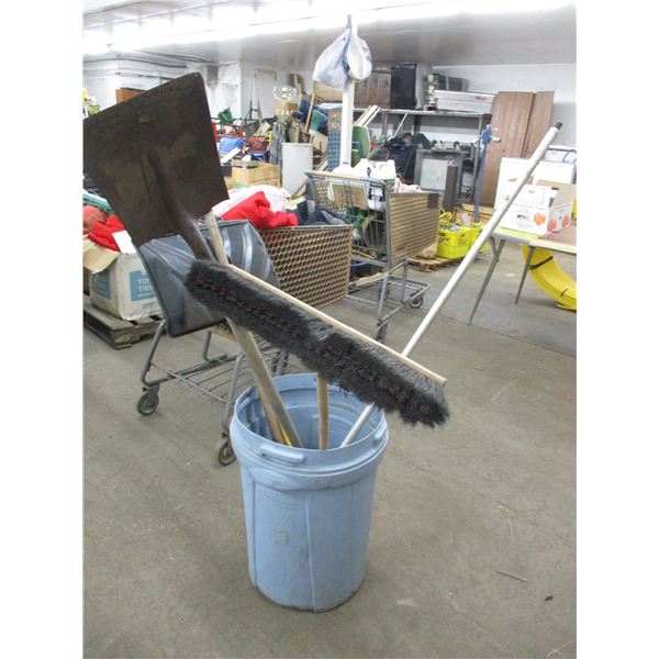 Garbage can with broom, shovel, rake, snow school