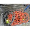 Image 2 : Shopping cart with extension cords, some missing ends