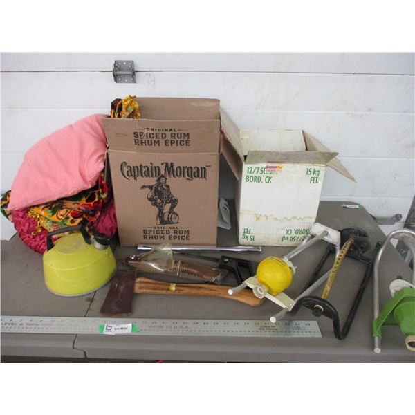 Small axe, golf balls, blanket