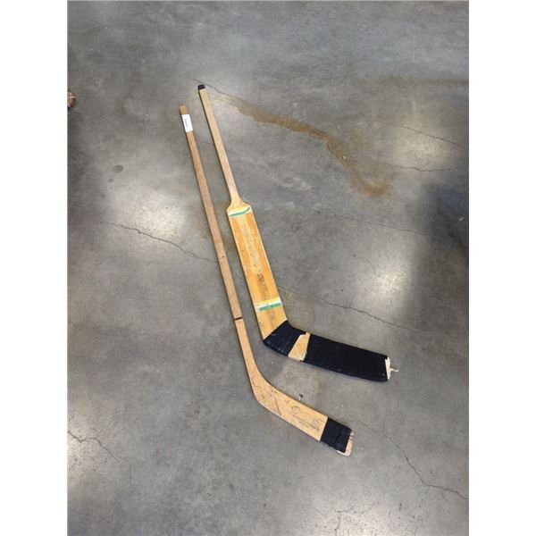 1950'S HOCKEY STICK AND GOALIE STICK