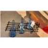 Image 2 : AMBER GLASS JAR AND GUITAR LIQUOR BOTTLES ON MUSIC NOTE RACK