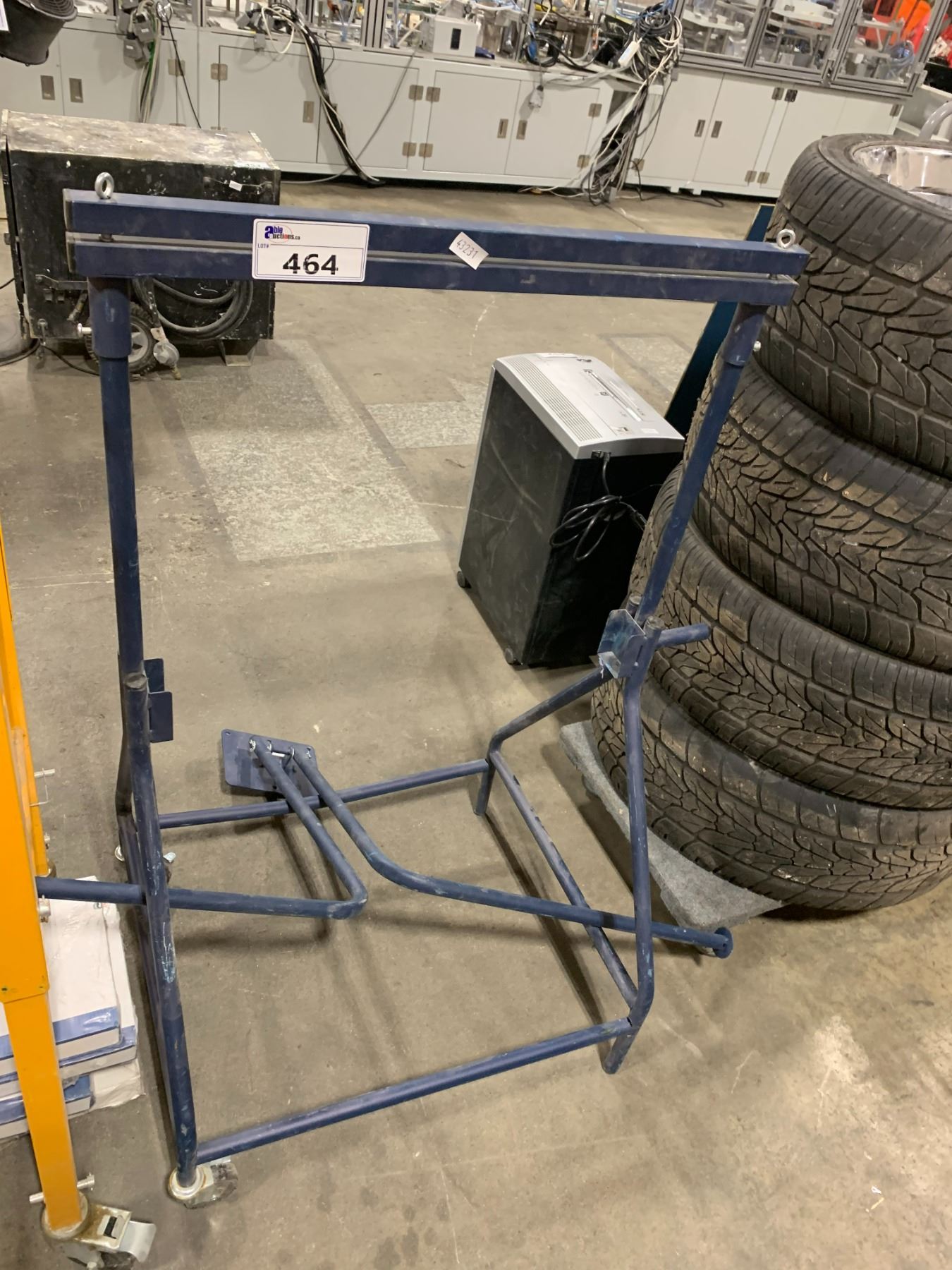 Uline Blue Racking BLUE METAL ULINE MOBILE PAINTERS PAPER RACK - Able Auctions