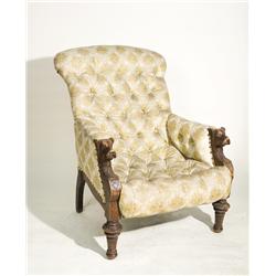 Antique Tufted Arm Chair with Carved Dog Head Arms 