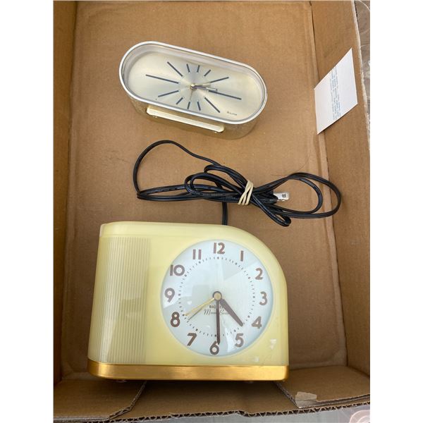 Beg bin and Bulova clocks