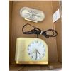 Image 1 : Beg bin and Bulova clocks