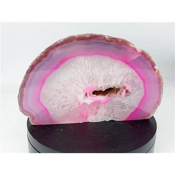 DYED BRAZILIAN AGATIZED CRYSTAL WITH SMALL GEODE