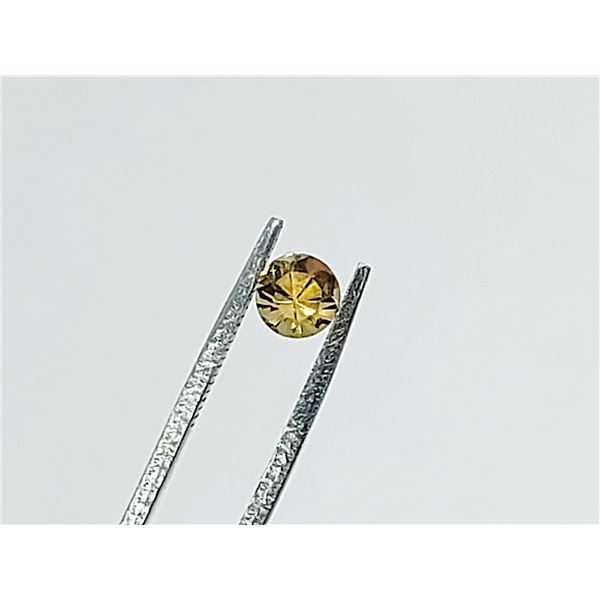 0.55 ct. YELLOW TANZANITE