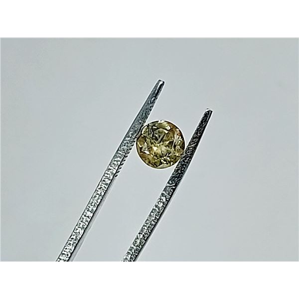 0.82 ct. YELLOW TANZANITE