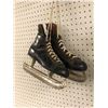 Image 2 : "The Horror Show" - Group of 3 ice-skating boots & 1 pair of vintage rolling skates