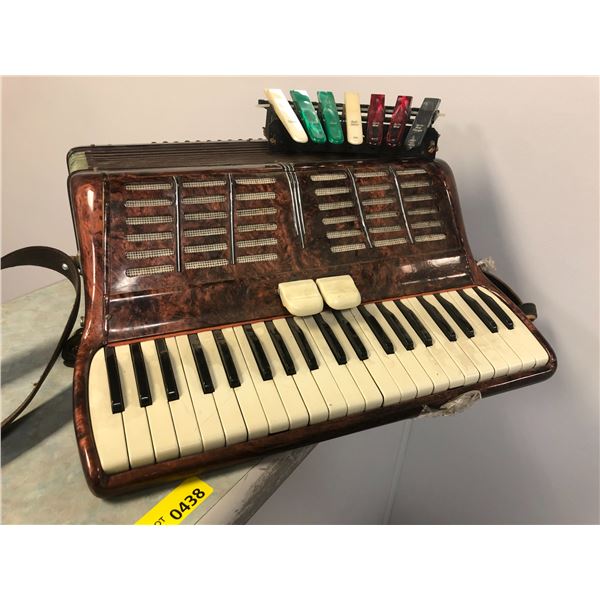 Vintage piano accordion w/ set of musical instrument keys