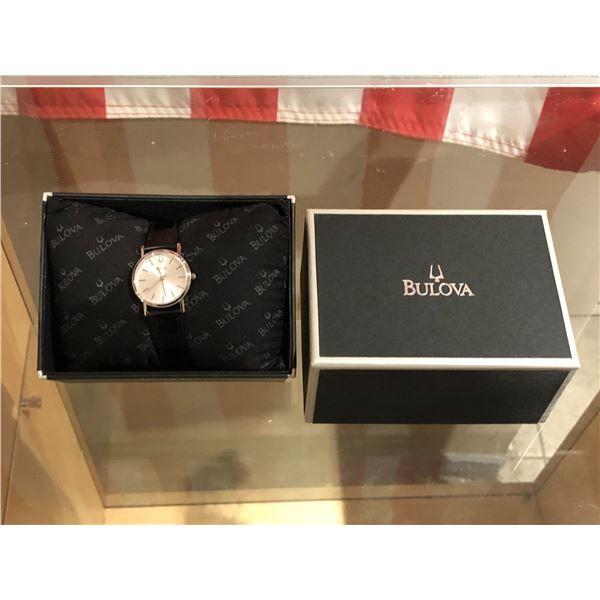 New Bulova lady's wrist watch w/ leather strap (new and box)