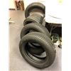 Image 1 : Group of assorted rubber tires