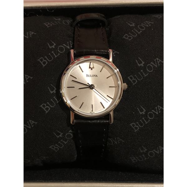 New Bulova lady's wrist watch w/black leather strap (new and box)