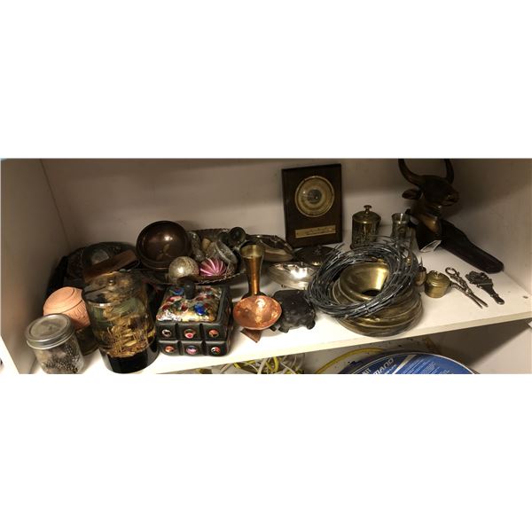 Shelf full of assorted decorative pieces