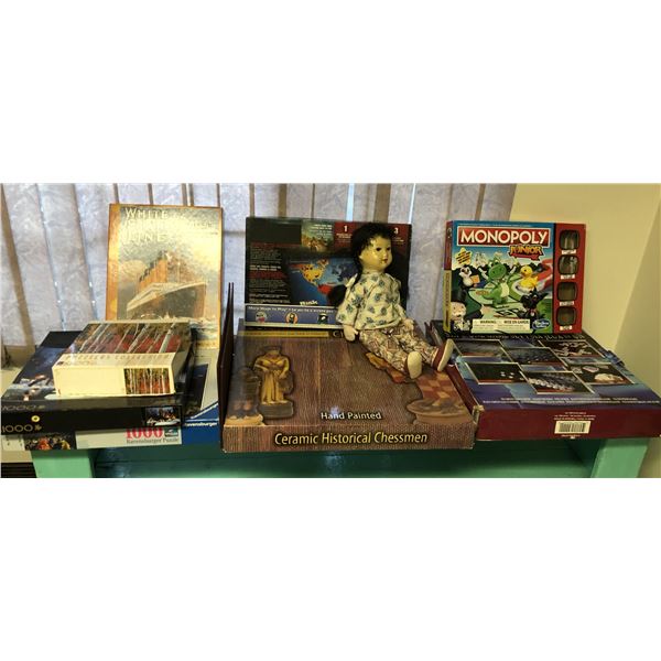 Large group of assorted kids boardgames and puzzles