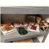 Image 1 : Shelf full of of assorted magazines/novels etc.