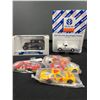 Image 1 : Nice Little Automotive Lot. Ford Model A 1:43 Scale in Box.Dealership Truck  and 4 Cars in Packages.