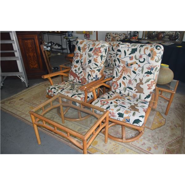 RATTAN SWIVEL ROCKERS W/CREWEL EMBROIDERED UPHOLSTERY & GLASS TOP RECTANGULAR TABLE (3 PCS)