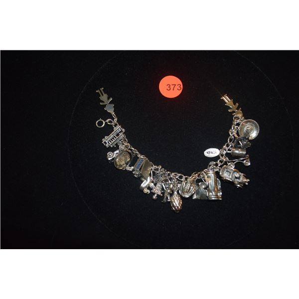 STERLING SILVER CHARM BRACELET (22 CHARMS)