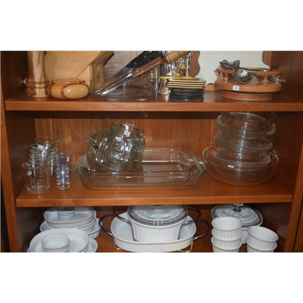COLLECTION OF PYREX CASSEROLE DISHES (SOME W/COVERS), BAKING DISHES, MEASURING CUPS & CUSTARD DISHES