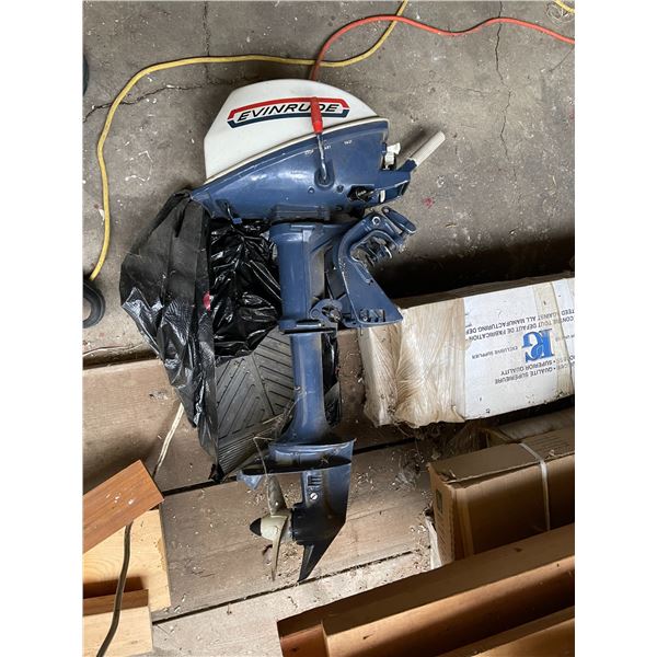 Evinrude 4 HP Boat Motor (Contains metal gas tank from lot 263)