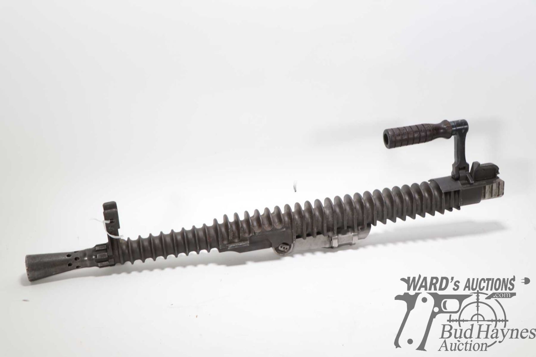 Vintage machine gun barrel with cooling fins, handle and front sight ...