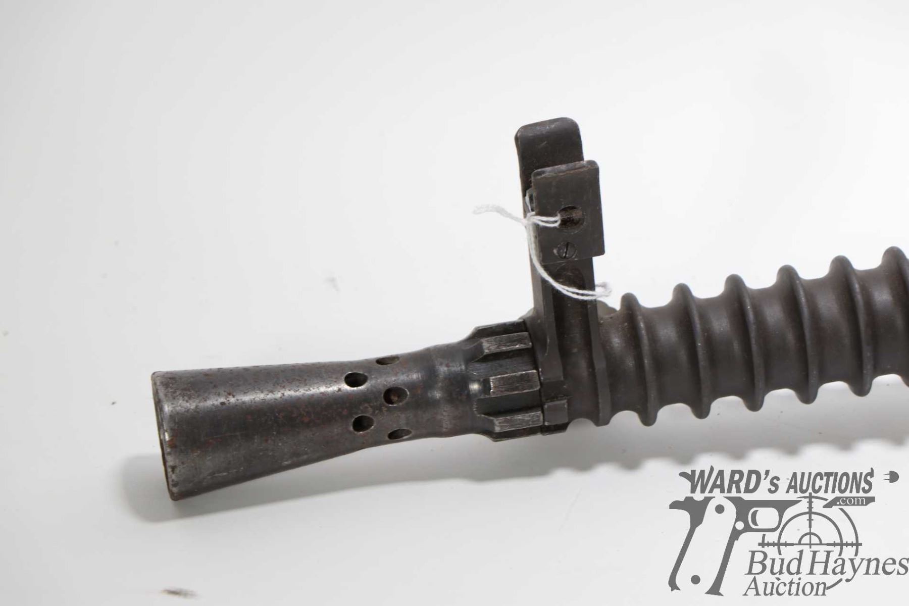 Vintage machine gun barrel with cooling fins, handle and front sight ...