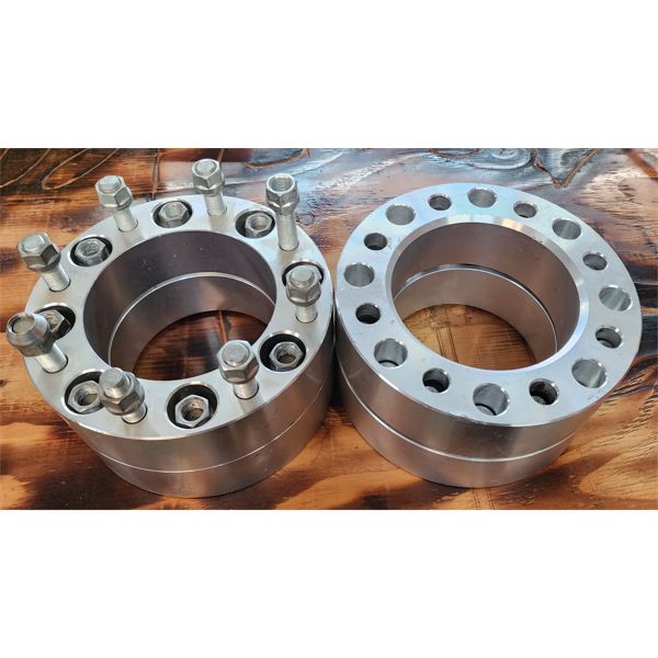 2 ALULMINUM WHEEL ADAPTERS 