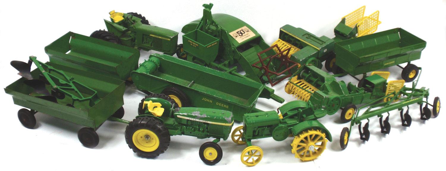 Farm toys (12), Ertl 50th Anv. JD 12A combine, Ertl spreader 2576