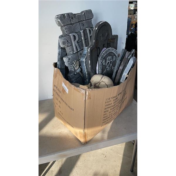 BOX OF 12 FOAM TOMBSTONES AND 6 FOAM SKULLS