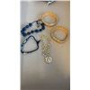 Image 1 : 4 BRACELETS - 2 VINTAGE GOLD TONE BANGLES, 2 SKULL BEAD BRACELETS, AND  GOLD TONE GRYFFINDOR BRACELE