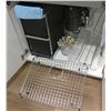 Image 1 : Misc Kitchen Essentials: Metal Racks, Garbage Disposal, Storage Bin, Décor, etc