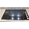 Image 1 : Miele Schott Ceran Induction Cooktop Black 36"x21" (Comes with Range Hood)