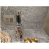 Image 2 : Vanity Décor: Georg Jensen Dispenser, Woven Mats, Candles, etc