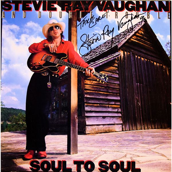 Stevie Ray Vaughan and Double Soul To Soul signed album