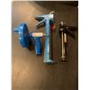 Image 1 : Two Caulking Guns and a Drain Snake