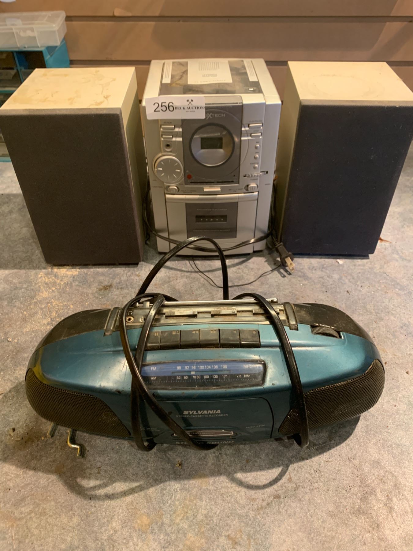 NexxTech CD Player Radio Cassette Player and a Sylvania Ghetto Blaster