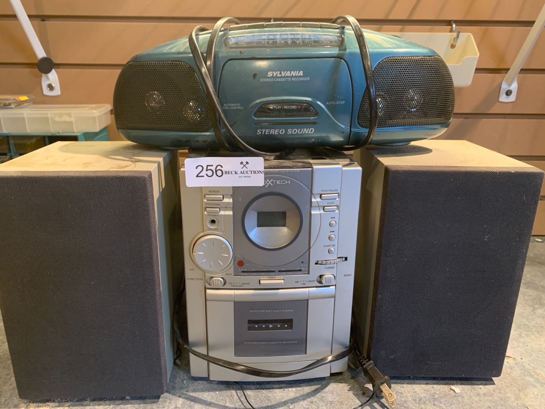 NexxTech CD Player Radio Cassette Player and a Sylvania Ghetto Blaster
