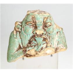 Egyptian green glaze statuette of Bes fragment. Third Intermediate Period, circa 1069-656 B.C.