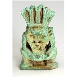 Egyptian double-faced pale green faience amulet of Bes. Late Period, after 700 B.C.