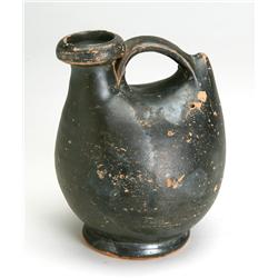 Greek South Italian black glazed pottery Askos. Circa 4th century B.C.