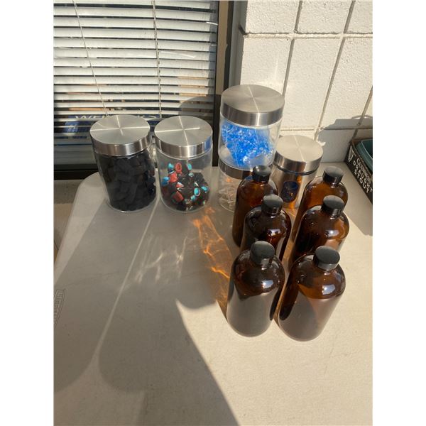 Canisters and contents and bottles empty