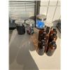 Image 1 : Canisters and contents and bottles empty