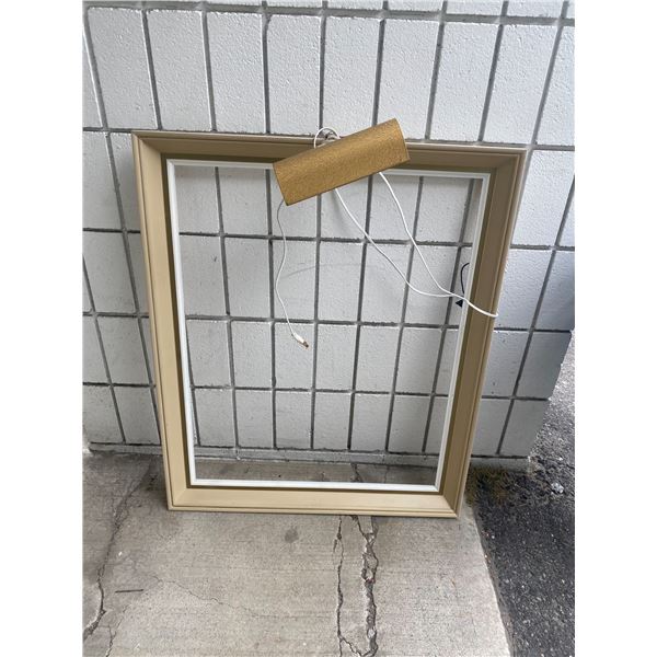 Frame with light inside frame measures 24"x30"