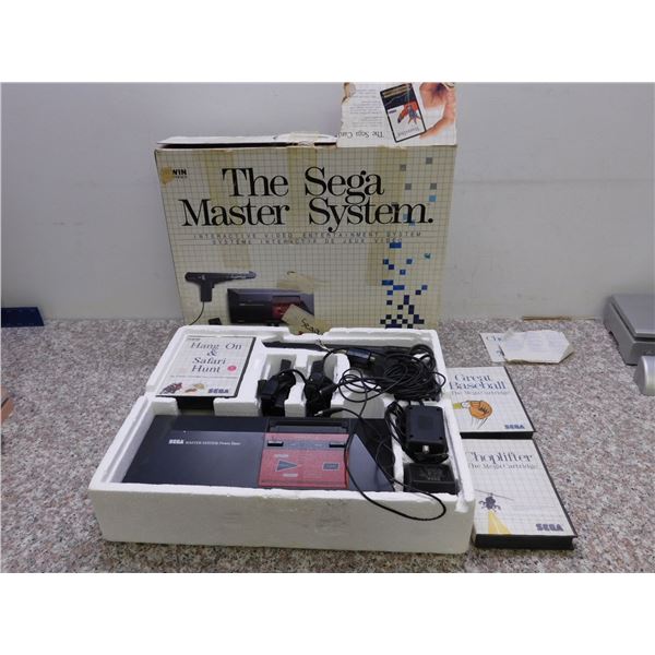 SEGA Master System + Box, Controllers, Cables, Canadian Box and 2 Games